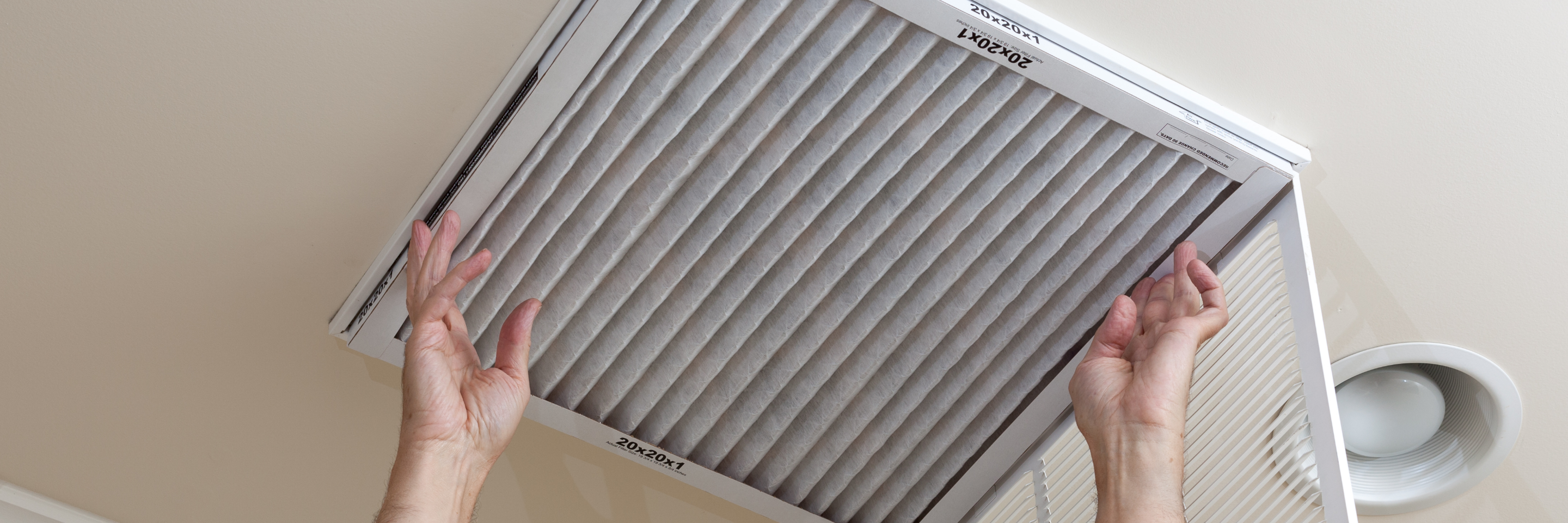 2880x960 Installation of HVAC air filter with media made with Filtura filtration materials.png